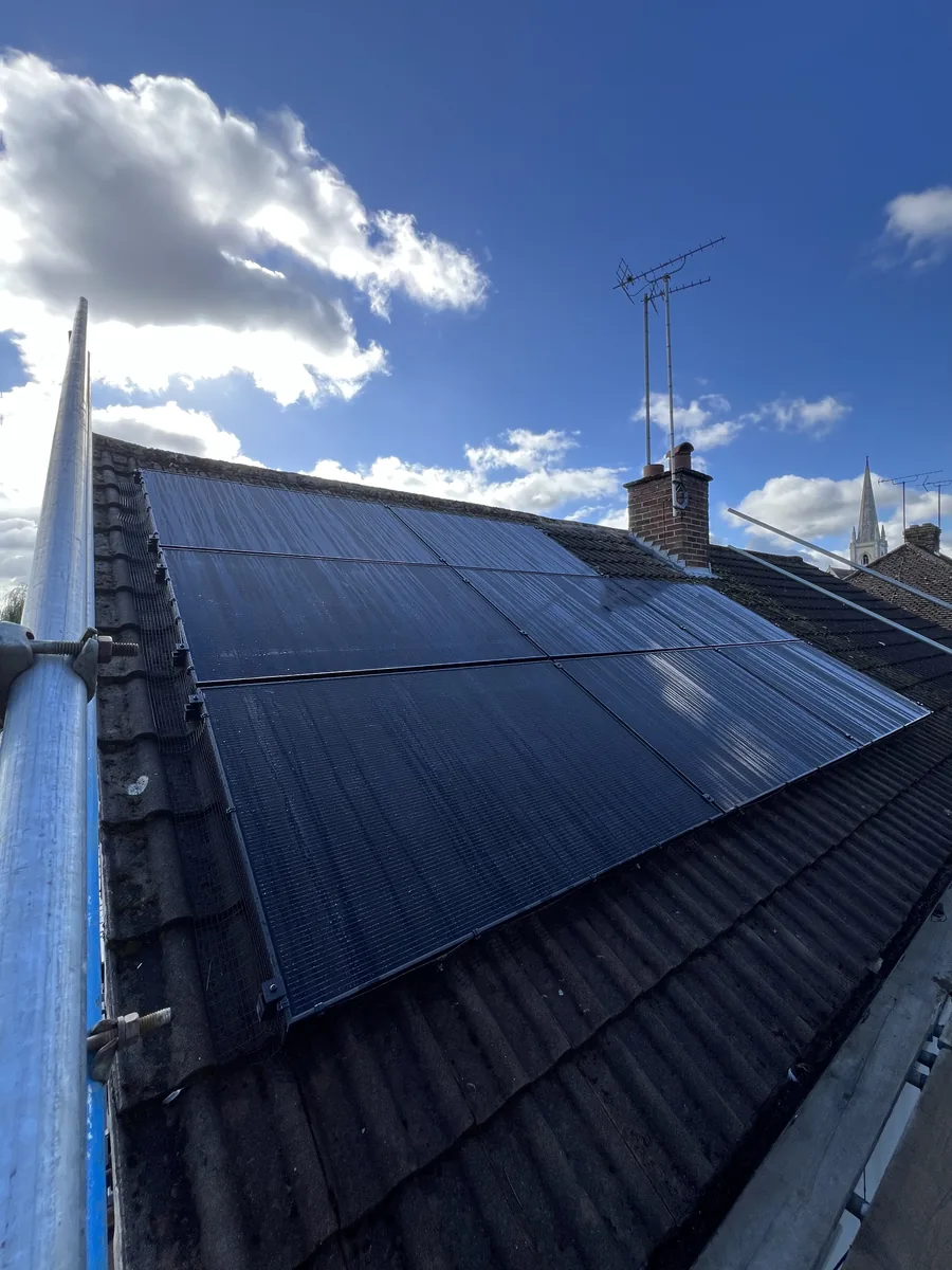 Second close-up of the freshly installed panels on a Cheltenham roof, from the scaffold